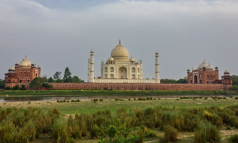 The Taj Mahal seen from the bank of the Yamuna river, in Agra