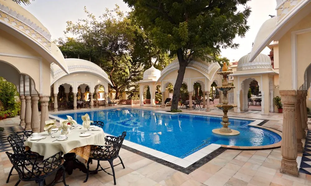 Pool and arches of a heritage haveli in Bani Park, Jaipur