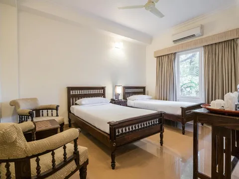 Room with two beds of Tissa's Inn in Kerala